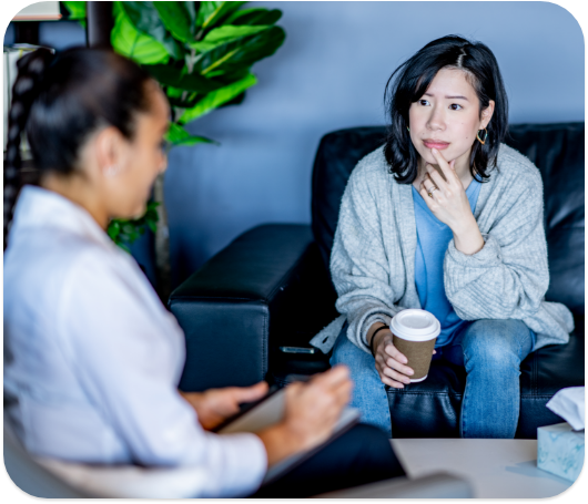 Therapist in a discussion with their client