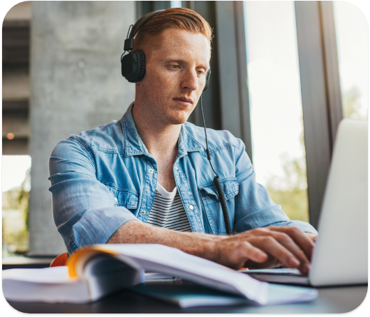 A student studying on their computer