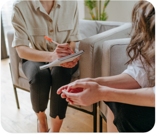 two people in a therapists office