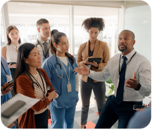 A group of people in the medical field in a group discussion.