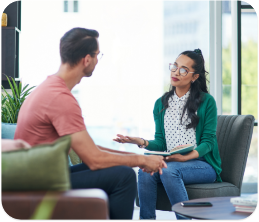 Therapist in a discussion with a client