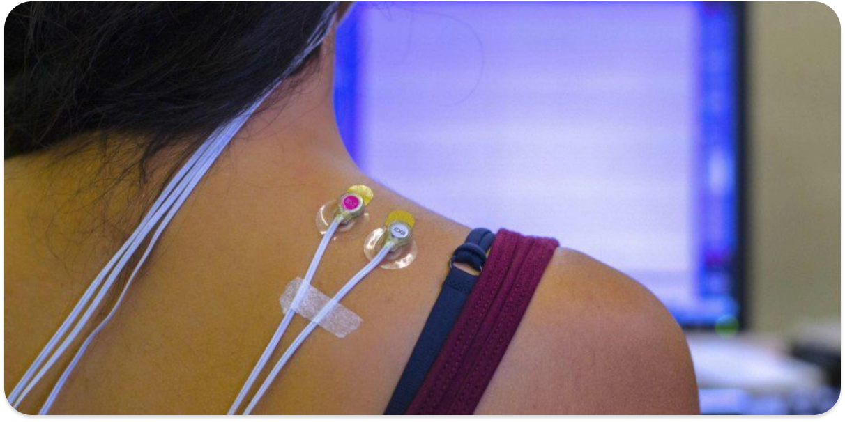monitor nodes attached to woman's shoulder